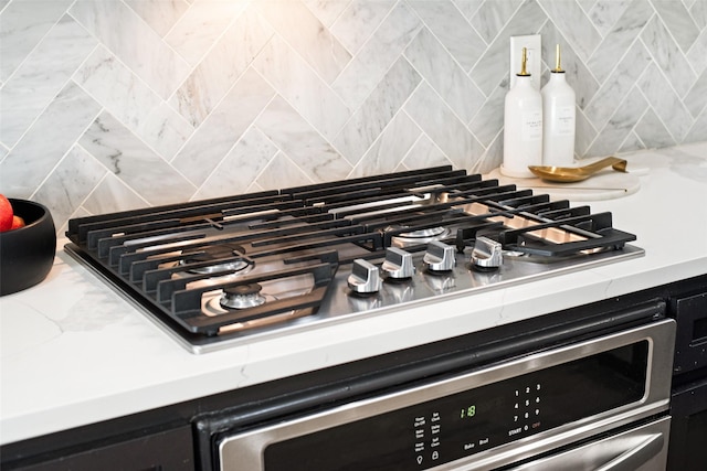 13293 Grayhawk Blvd, Frisco, TX 75033 - kitchen view of decorative backsplash and stainless steel gas stovetop