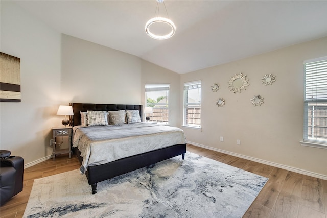 13293 Grayhawk Blvd, Frisco, TX 75033 - bedroom featuring lofted ceiling, baseboards, and multiple windows