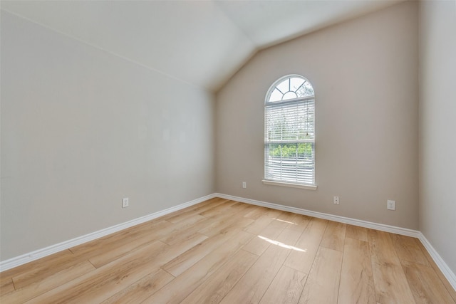 13293 Grayhawk Blvd, Frisco, TX 75033 - unfurnished room featuring light wood-style flooring, baseboards, and lofted ceiling
