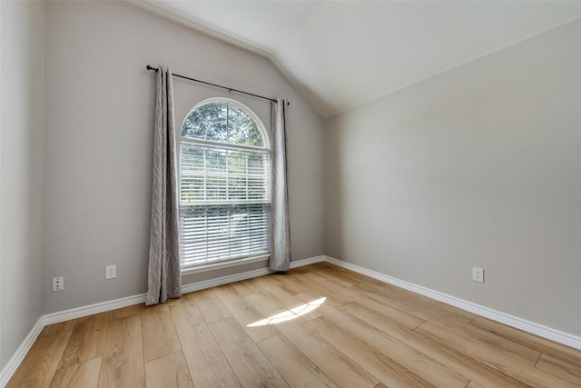 13293 Grayhawk Blvd, Frisco, TX 75033 - unfurnished room featuring wood finished floors, vaulted ceiling, and baseboards