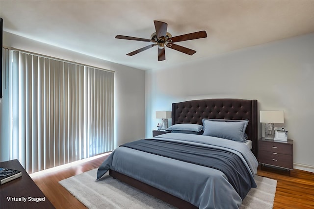 1301 Memory Ln Unit 4920, Arlington, TX 76011 - bedroom featuring wood finished floors and a ceiling fan