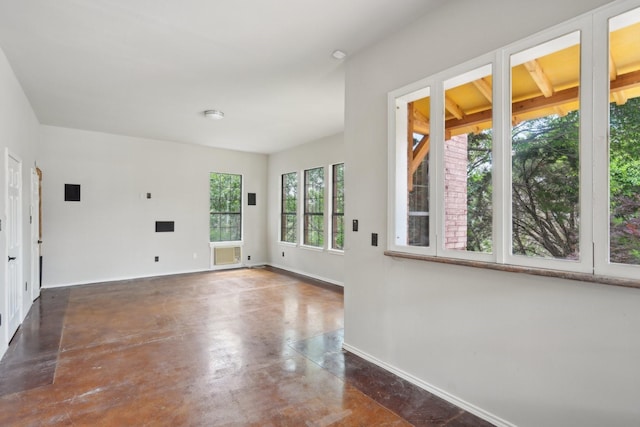 2224 Bluff Ct, Cedar Hill, TX 75104 - empty room featuring concrete flooring and baseboards