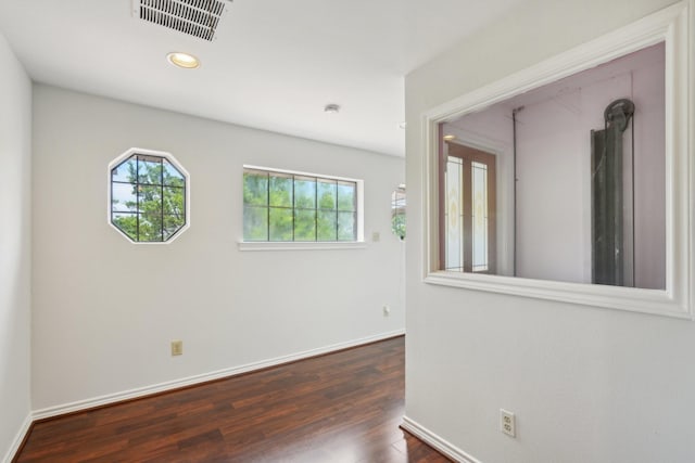 2224 Bluff Ct, Cedar Hill, TX 75104 - spare room featuring dark wood-style flooring, baseboards, and recessed lighting