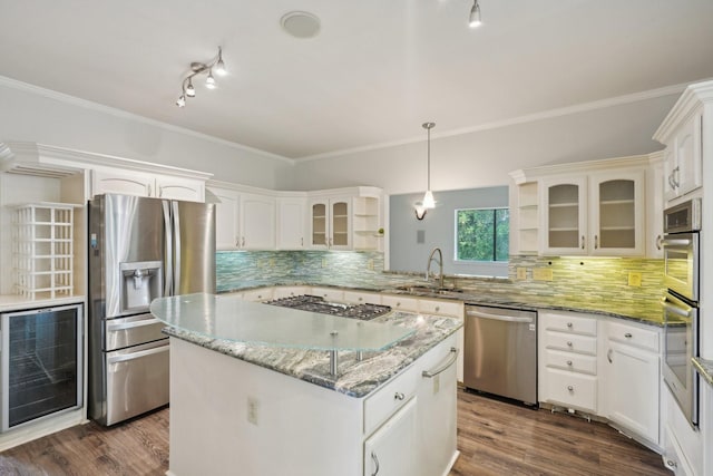 2224 Bluff Ct, Cedar Hill, TX 75104 - kitchen featuring wine cooler, stainless steel appliances, a sink, glass insert cabinets, and a kitchen island