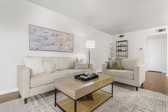 2800 Escada Dr Unit 207, Farmers Branch, TX 75234 - living area with wood finished floors and baseboards
