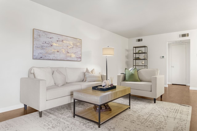 2800 Escada Dr Unit 207, Farmers Branch, TX 75234 - living room featuring wood finished floors and baseboards