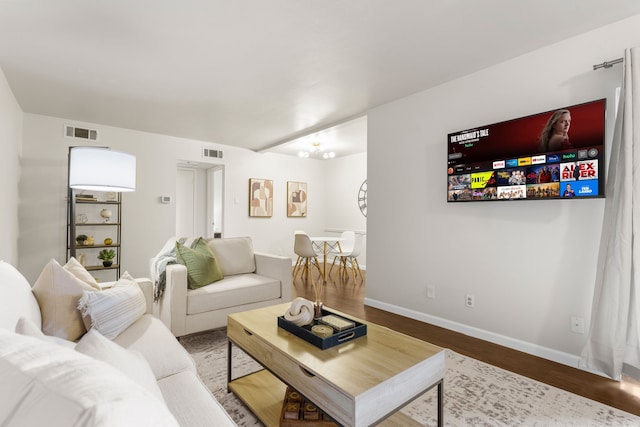 2800 Escada Dr Unit 207, Farmers Branch, TX 75234 - living room featuring wood finished floors and baseboards