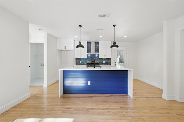 10626 Desdemona Dr, Dallas, TX 75228 - kitchen featuring wall chimney range hood, stainless steel electric range, white cabinets, baseboards, and decorative backsplash