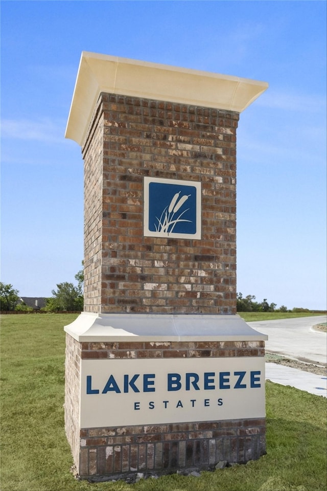 213 Yaupon Holly St, Lavon, TX 75166 - community sign featuring a yard