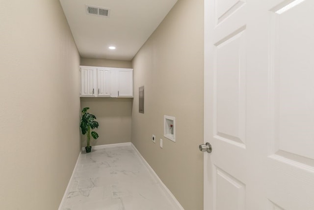 2400 Clearwood Dr, Arlington, TX 76014 - washroom with cabinet space, hookup for an electric dryer, marble finish floors, washer hookup, and baseboards