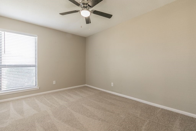 2400 Clearwood Dr, Arlington, TX 76014 - unfurnished room with carpet flooring, baseboards, a ceiling fan, and healthy amount of natural light