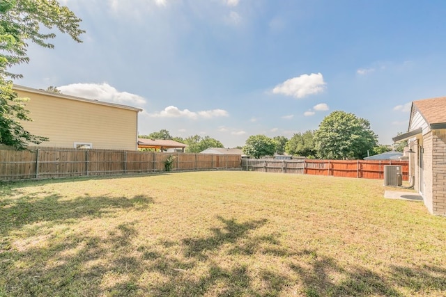 2400 Clearwood Dr, Arlington, TX 76014 - view of yard featuring central AC unit
