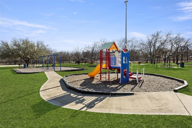 196 Pintail, Rhome, TX 76078 - community playground with a lawn