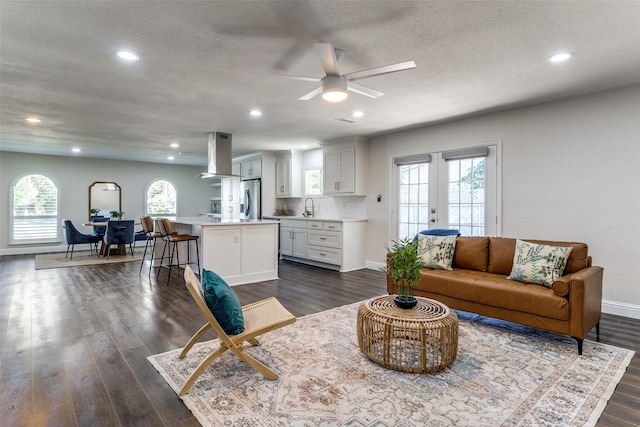 11750 Featherbrook Dr, Dallas, TX 75228 - living area featuring french doors, baseboards, dark wood-type flooring, recessed lighting, and ceiling fan