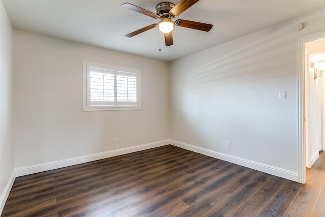 11750 Featherbrook Dr, Dallas, TX 75228 - spare room featuring dark wood-style floors, baseboards, and a ceiling fan