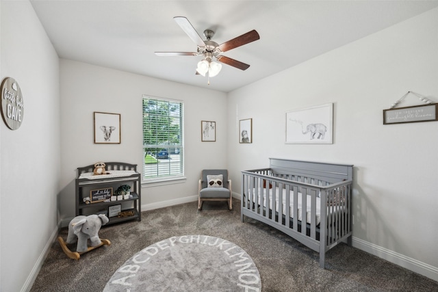 6217 Cheshire St, Celina, TX 76227 - bedroom featuring carpet floors, baseboards, a nursery area, and ceiling fan