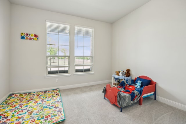2811 Trinity Ridge St, Mansfield, TX 76063 - recreation room featuring healthy amount of natural light, carpet flooring, and baseboards