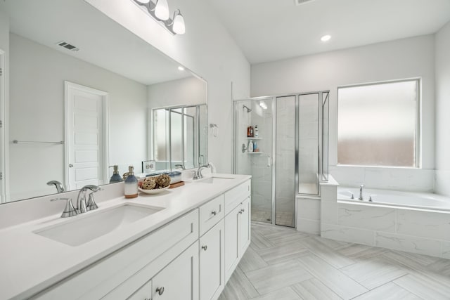 2811 Trinity Ridge St, Mansfield, TX 76063 - bathroom with a garden tub, double vanity, a shower stall, and recessed lighting