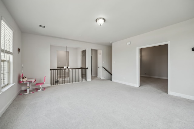 2811 Trinity Ridge St, Mansfield, TX 76063 - carpeted spare room with plenty of natural light and baseboards