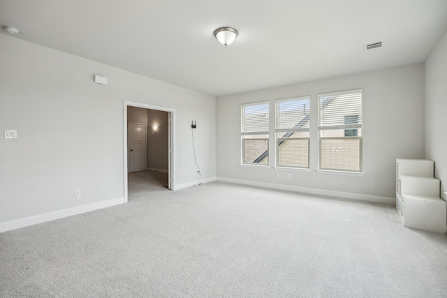 2811 Trinity Ridge St, Mansfield, TX 76063 - unfurnished room with light carpet, baseboards, and a smoke detector