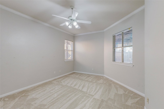 2728 Gull Lake Dr, Plano, TX 75025 - spare room featuring light colored carpet, ornamental molding, baseboards, and ceiling fan