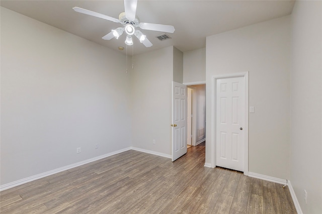 2728 Gull Lake Dr, Plano, TX 75025 - spare room with light wood-style flooring, a ceiling fan, and baseboards