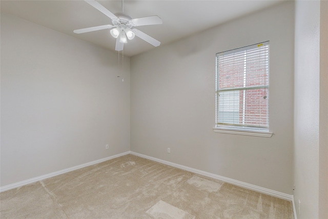 2728 Gull Lake Dr, Plano, TX 75025 - unfurnished room with light colored carpet, baseboards, and ceiling fan