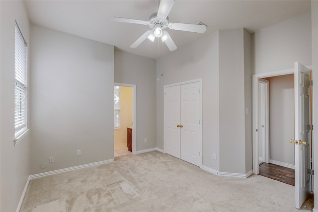 2728 Gull Lake Dr, Plano, TX 75025 - unfurnished bedroom with light colored carpet, multiple windows, and a closet