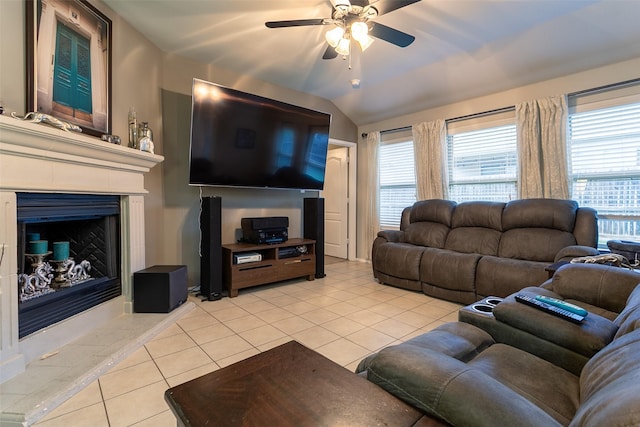 4633 Sleepy Meadows Dr, Fort Worth, TX 76244 - living room featuring a ceiling fan, light tile patterned floors, a fireplace, and vaulted ceiling