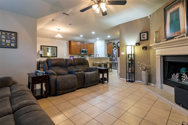 4633 Sleepy Meadows Dr, Fort Worth, TX 76244 - living area featuring a ceiling fan, light tile patterned floors, recessed lighting, a fireplace, and baseboards