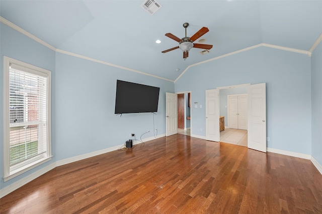 1405 Gunnison Dr, Waco, TX 76712 - unfurnished bedroom featuring multiple windows, lofted ceiling, baseboards, ornamental molding, and wood finished floors