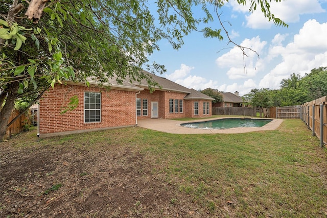 1405 Gunnison Dr, Waco, TX 76712 - rear view of property featuring brick siding and a patio