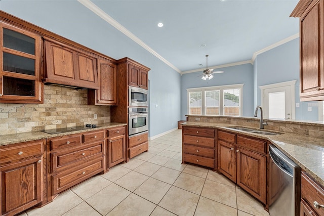 1405 Gunnison Dr, Waco, TX 76712 - kitchen with stainless steel appliances, a sink, tasteful backsplash, brown cabinetry, and ornamental molding