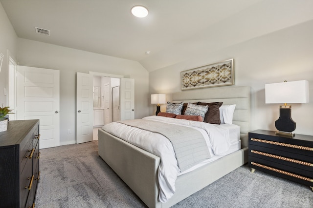 2002 Sandpiper Way, Princeton, TX 75407 - carpeted bedroom with lofted ceiling, baseboards, and ensuite bathroom
