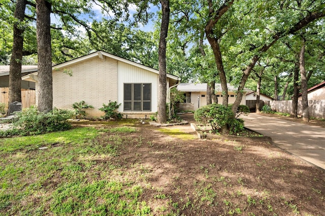 3416 Bristol Dr, Arlington, TX 76013 - mid-century inspired home with brick siding and driveway
