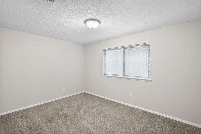 3416 Bristol Dr, Arlington, TX 76013 - empty room featuring carpet floors, a textured ceiling, and baseboards