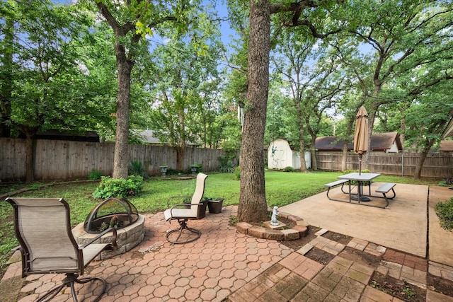 3416 Bristol Dr, Arlington, TX 76013 - view of patio featuring an outdoor fire pit