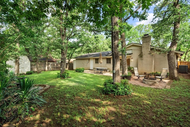 3416 Bristol Dr, Arlington, TX 76013 - view of yard with a fire pit, cooling unit, and a patio