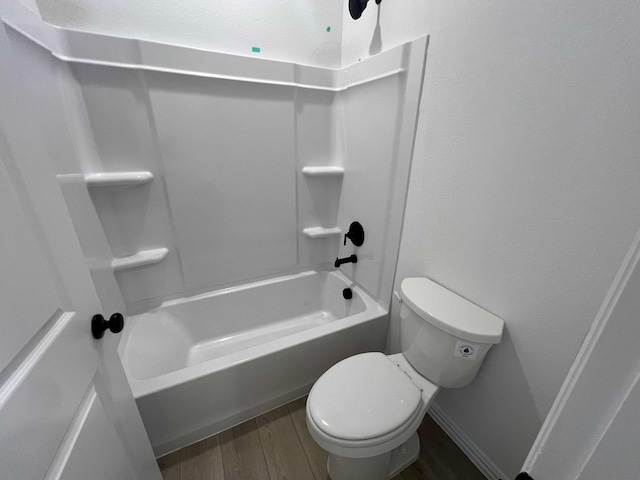 2121 Williams, Princeton, TX 75407 - full bathroom featuring wood finished floors,  shower combination, and toilet