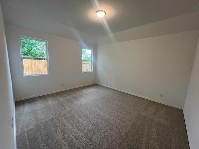 2121 Williams, Princeton, TX 75407 - spare room featuring dark colored carpet and baseboards