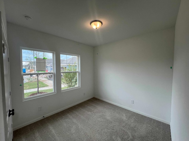 2121 Williams, Princeton, TX 75407 - spare room featuring carpet flooring, baseboards, and a smoke detector