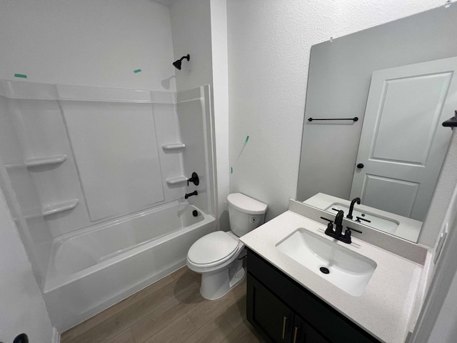 2121 Williams, Princeton, TX 75407 - bathroom featuring toilet, vanity, shower / washtub combination, and wood finished floors