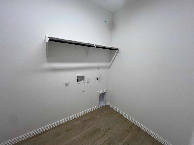 2121 Williams, Princeton, TX 75407 - laundry room featuring gas dryer hookup, hookup for an electric dryer, dark wood-type flooring, baseboards, and washer hookup