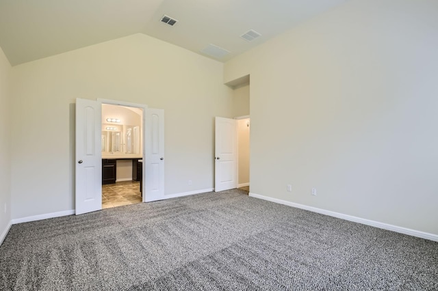 597 W Fate Main Pl, Fate, TX 75087 - unfurnished bedroom with carpet flooring, high vaulted ceiling, and connected bathroom