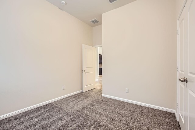 597 W Fate Main Pl, Fate, TX 75087 - unfurnished bedroom with carpet and baseboards