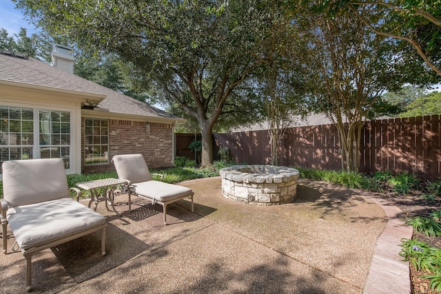 1317 Radisson Dr, Hewitt, TX 76643 - fenced backyard with a fire pit and a patio