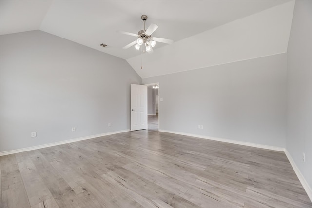 1707 Balboa Ln, Allen, TX 75002 - unfurnished room featuring lofted ceiling, ceiling fan, light wood-style flooring, and baseboards