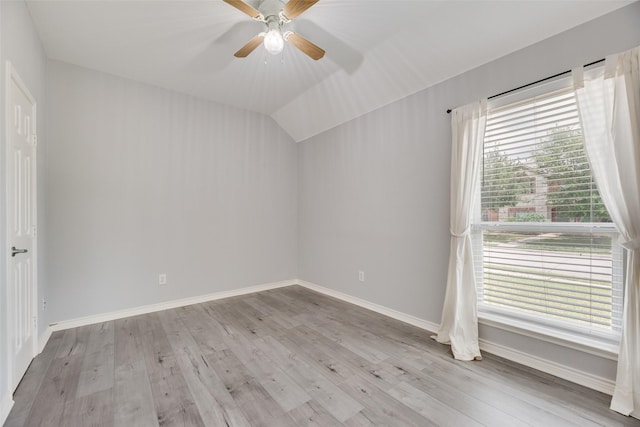 1707 Balboa Ln, Allen, TX 75002 - unfurnished room featuring wood finished floors, baseboards, ceiling fan, and vaulted ceiling