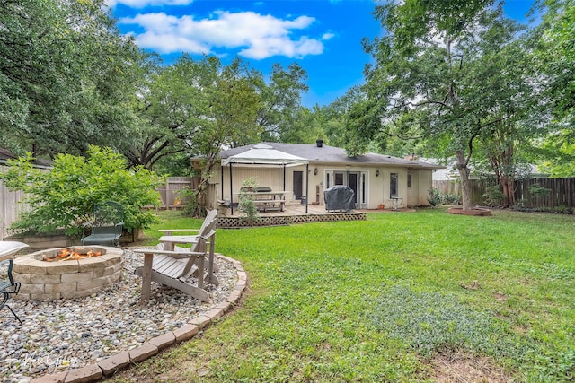361 Carrollton Ave, Shreveport, LA 71105 - back of house featuring an outdoor fire pit