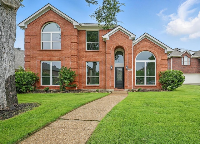 4309 Cutter Springs Ct, Plano, TX 75024 - traditional-style home with brick siding and a front lawn